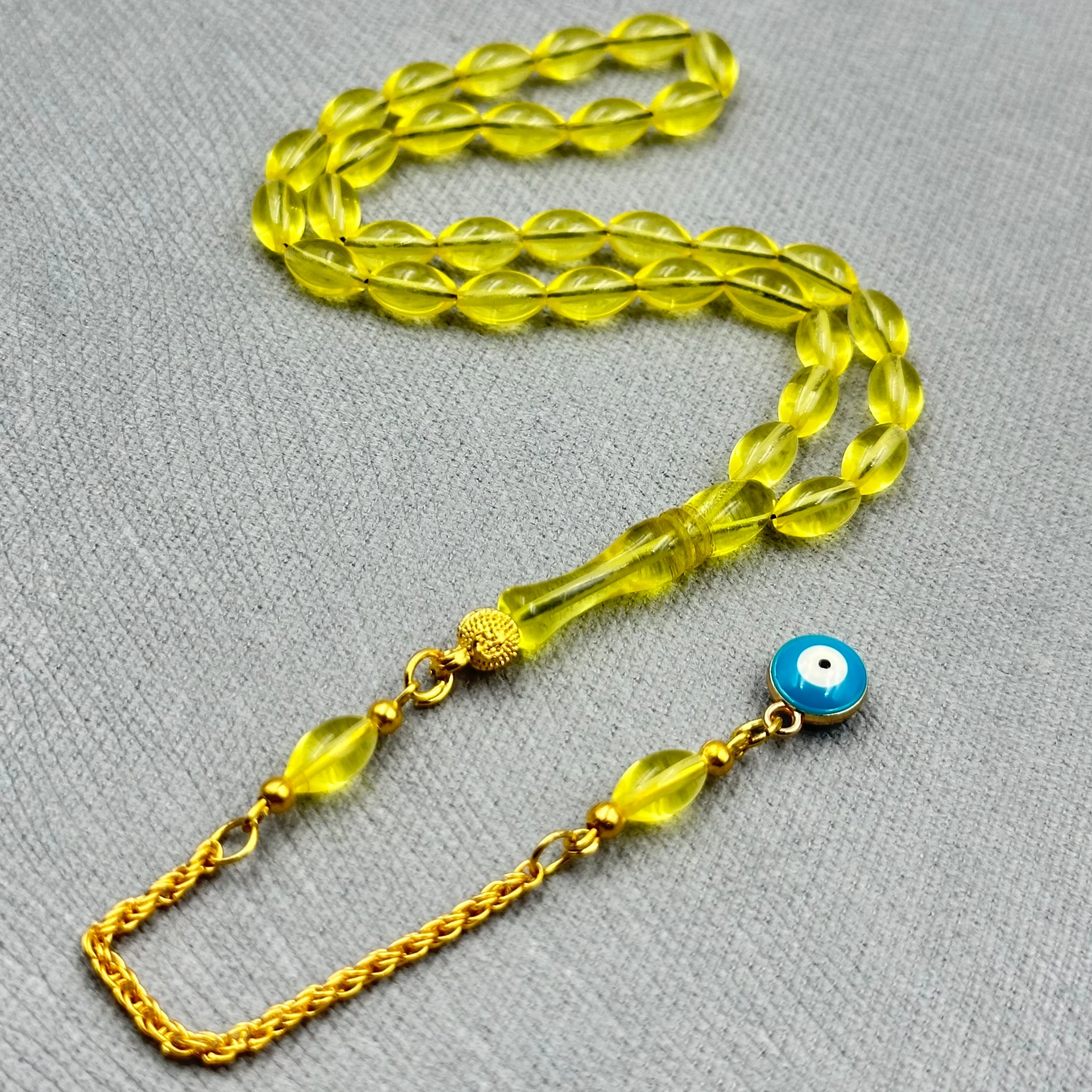 Pirinç Püsküllü Nazar Boncuğu Detaylı Bilek Boy Sarı Uçak Camı Tespih